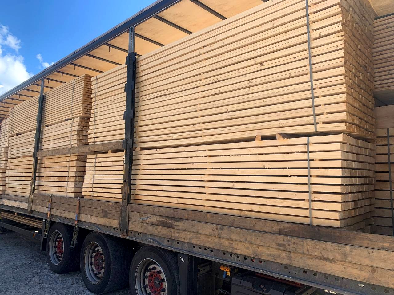Sawn timber loaded into a truck for export delivery
