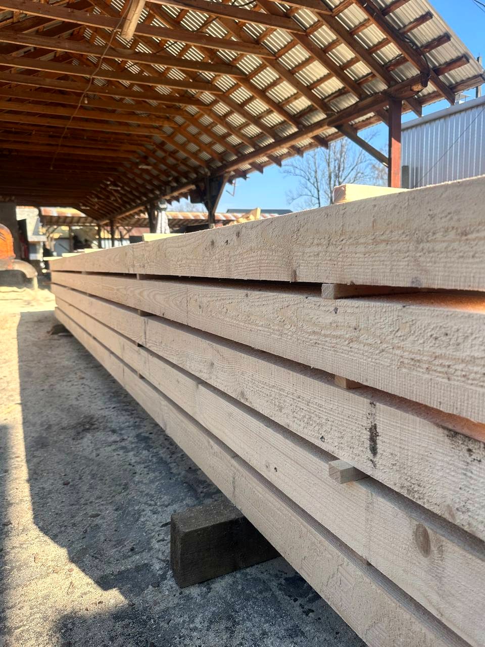 Close-up of sawn timber beams and wood grain